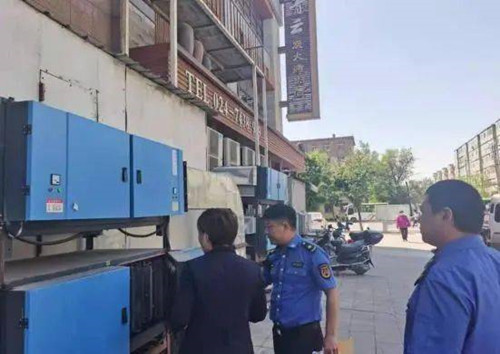 开原市综合行政执法局市容队推进餐饮经营单位油烟整治工作